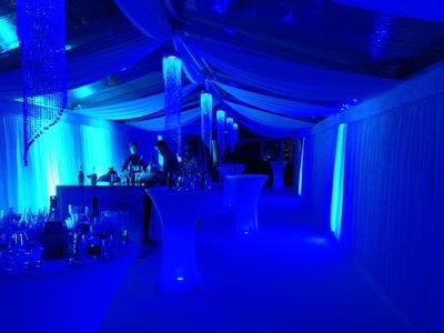 Marquee theme lighting in blue using battery up lights