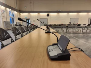 delegate microphone at a meeting. Gooseneck and speaker terminal for committee members to use